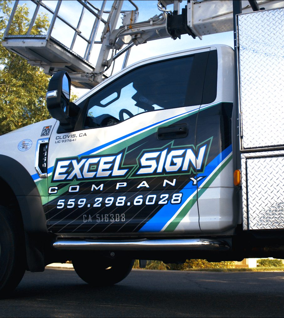 Excel Sign Company branded bucket truck in Clovis, CA