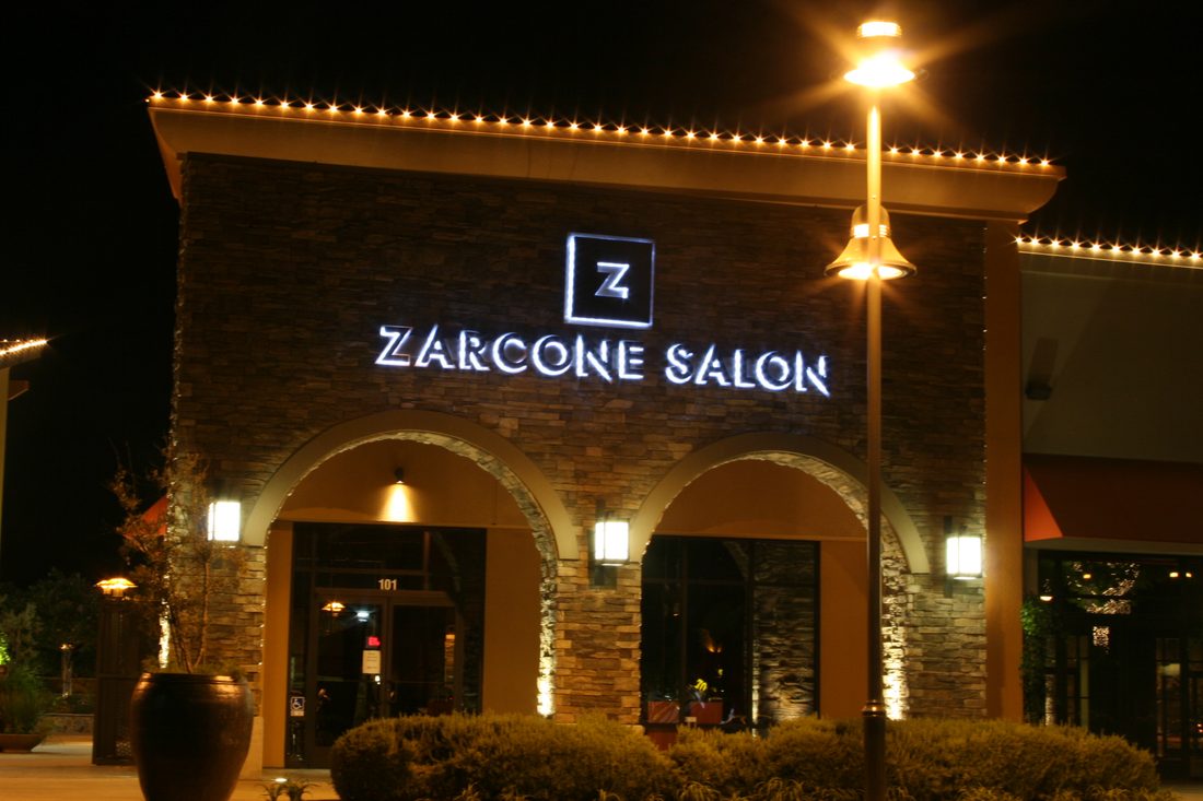 Illuminated channel letters on an auto shop storefront in Clovis